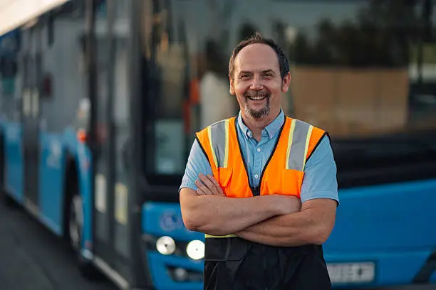 Bus driver transporting passengers safely